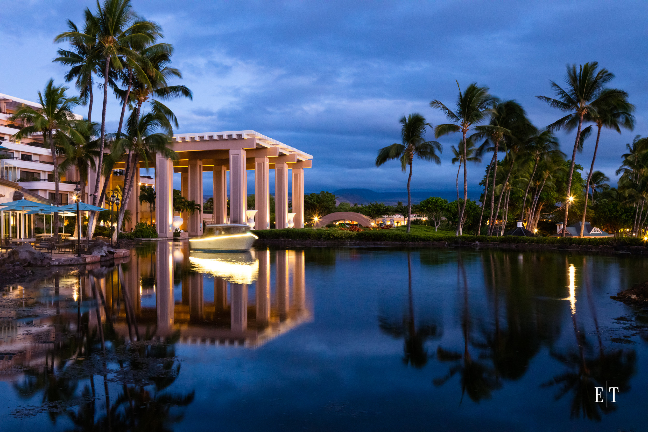 Hilton Waikoloa Village with new electric boat at twilght