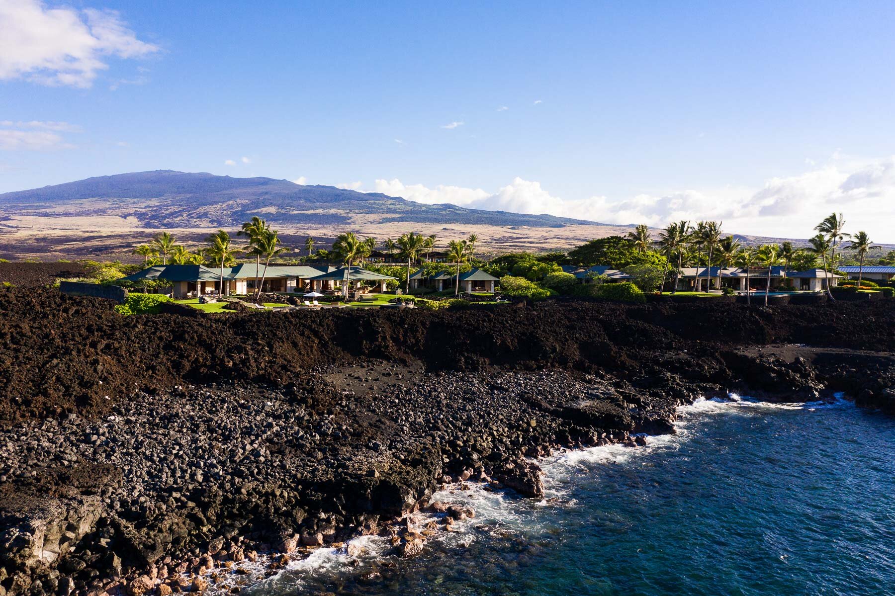  Ocean front with Hualalai rising in the distance 