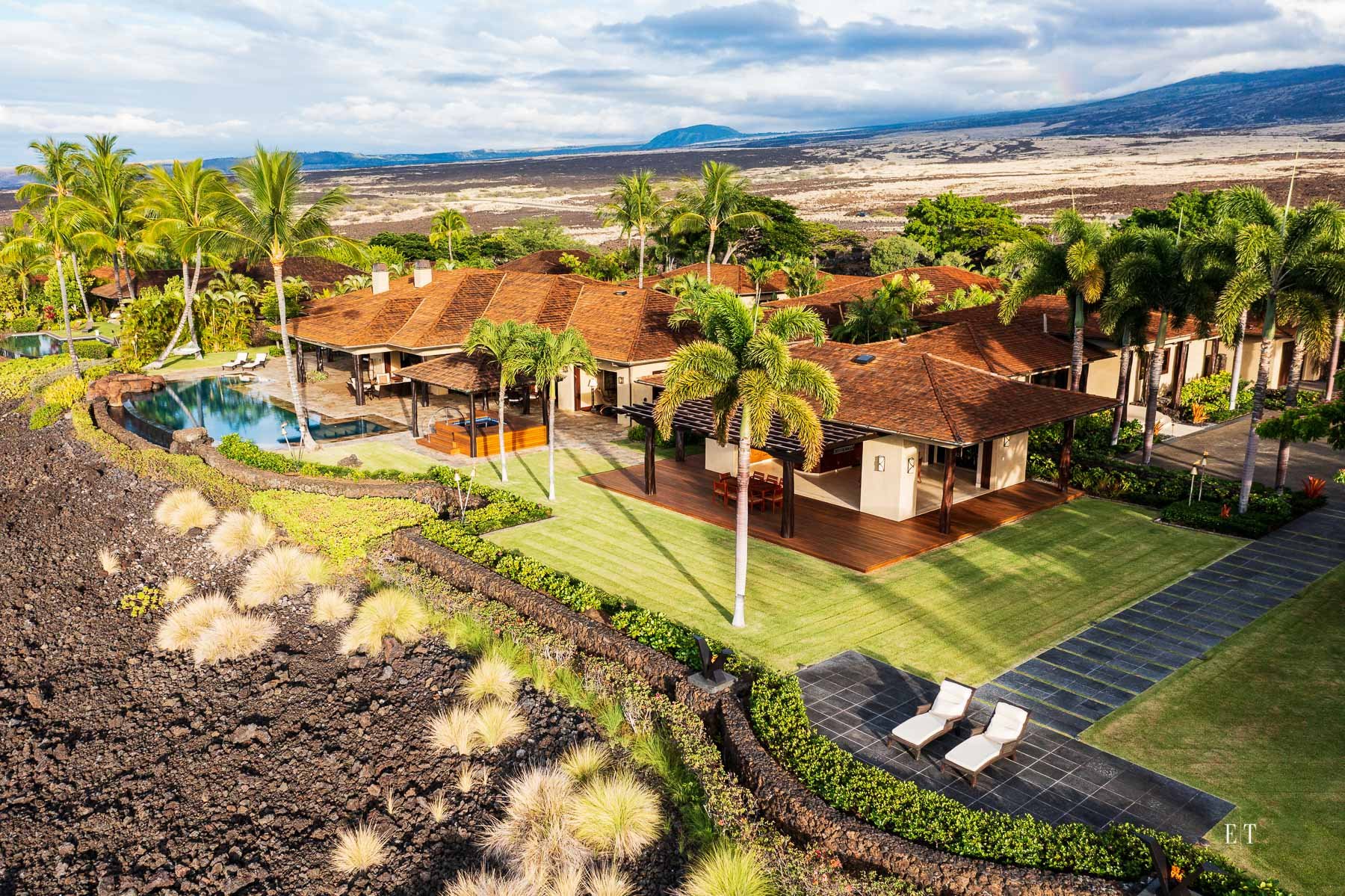  72-393 Kaupulehu Drive aerial overhead during the golden hour 