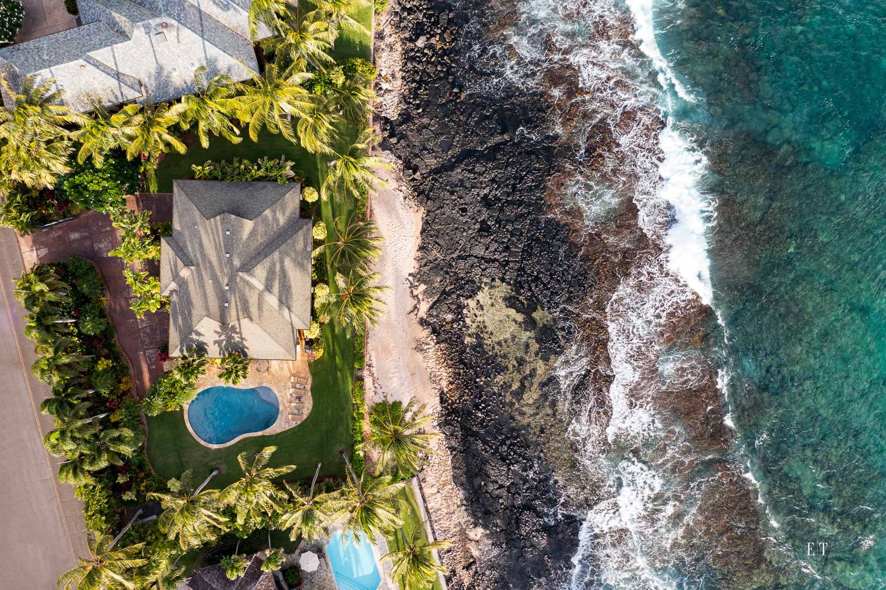  Aerial looking down on the oceanfront property 