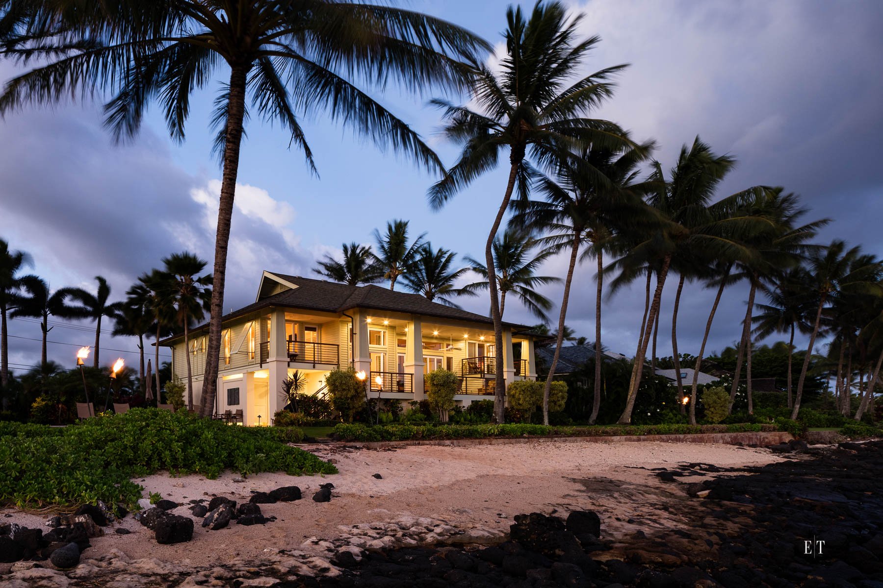  Twilight of their oceanfront home 