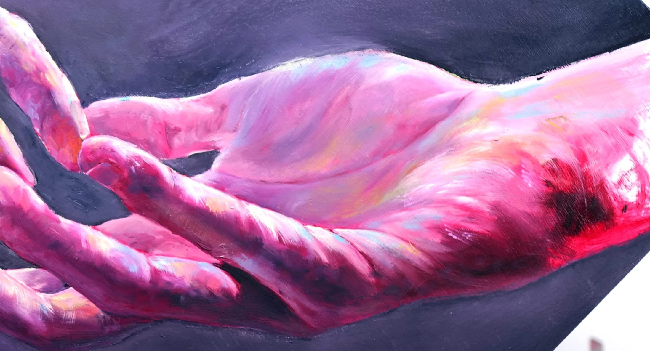 Close-up of a painting depicting two hands, primarily in shades of pink, with a dark background.