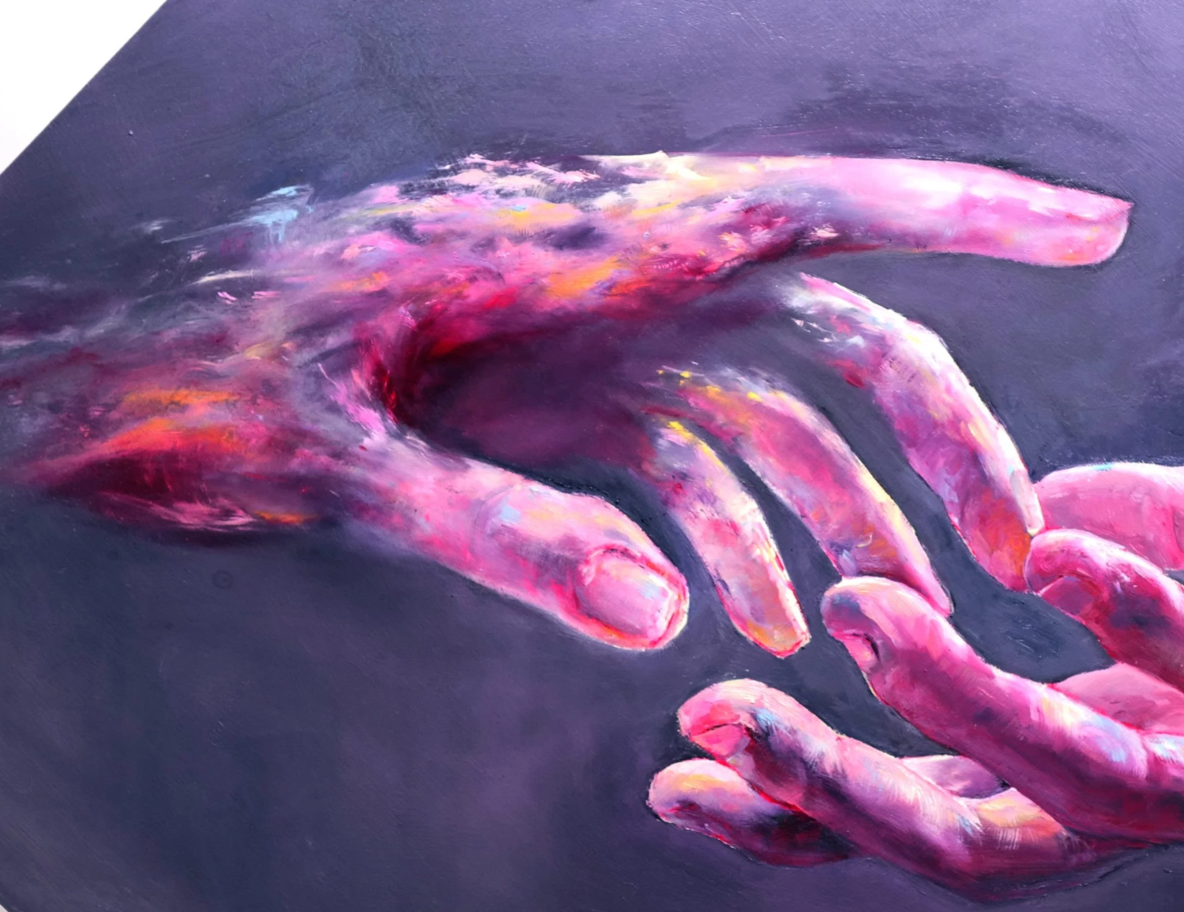 Close-up of a colorful, abstract painting of a hand using pink, purple, yellow, and white hues on a dark background.