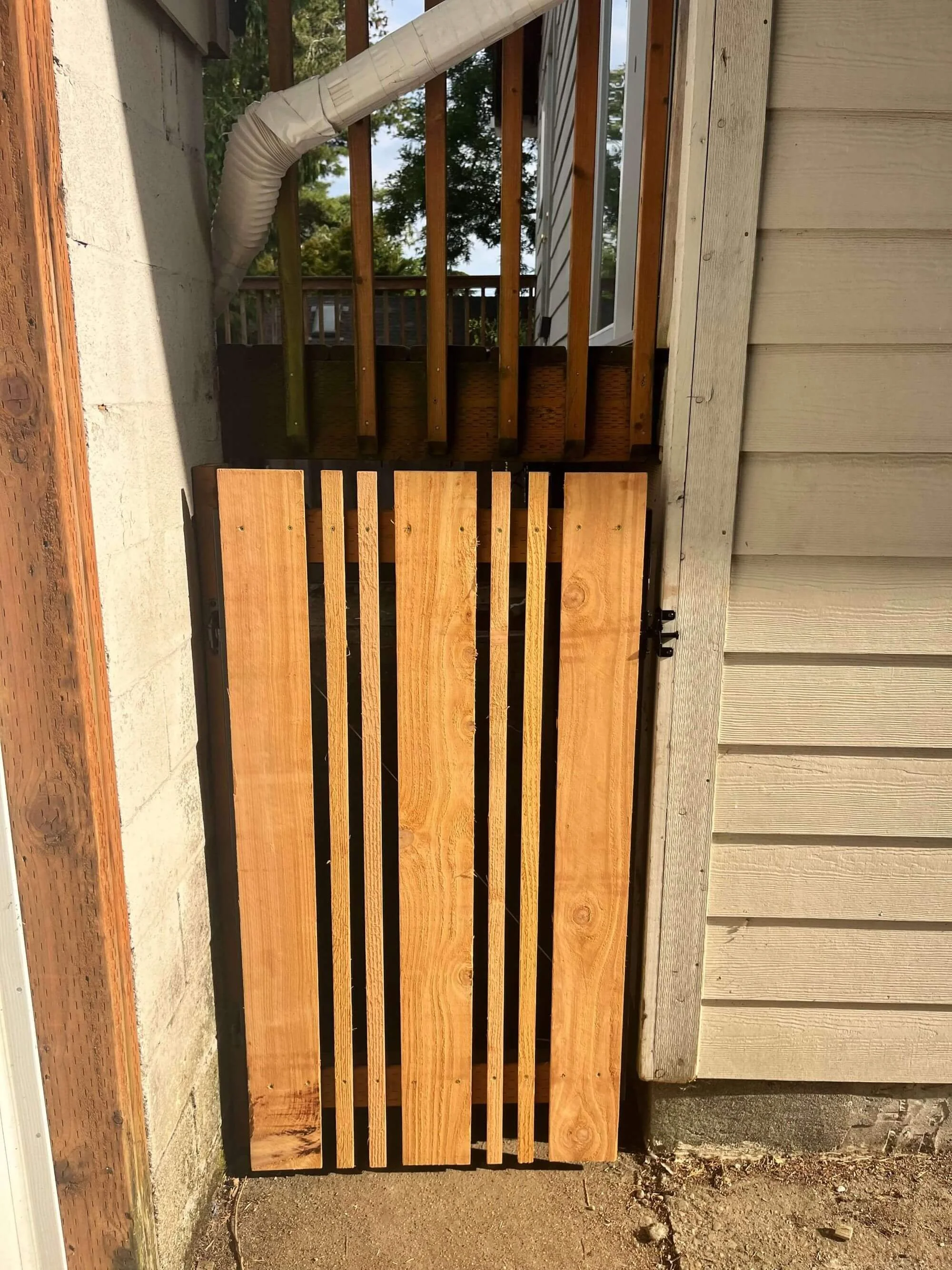 Unique custom fencing solution for a tight space in a Phinney Ridge homeowner's yard in Seattle.