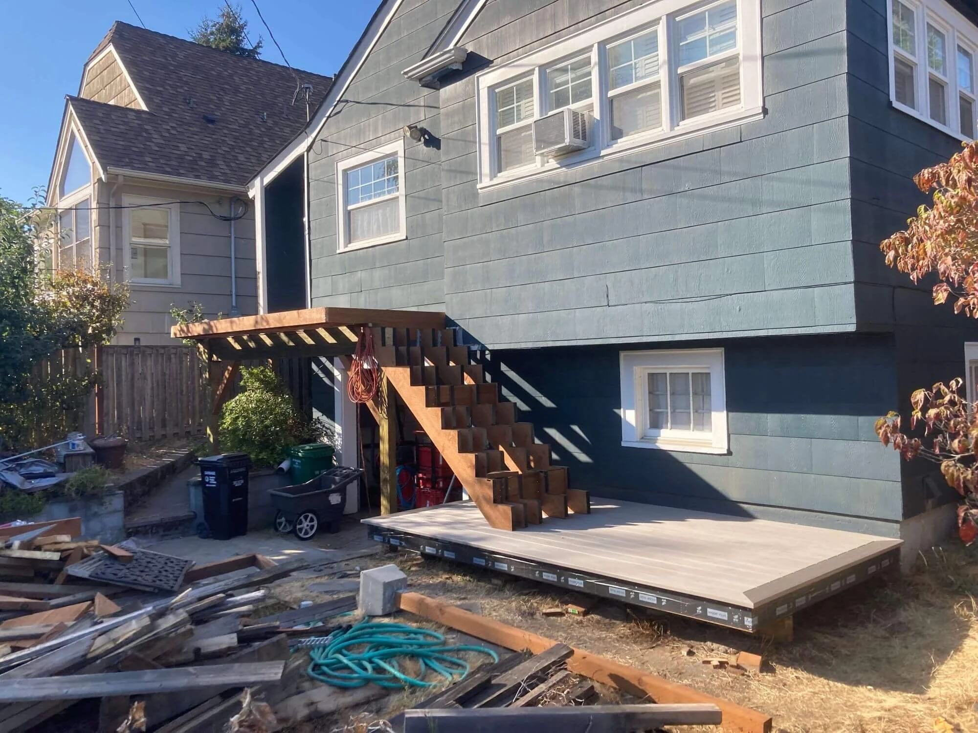 The new stairs are being added by Gold Mountain Contracting for this deck renovation project in Seattle.