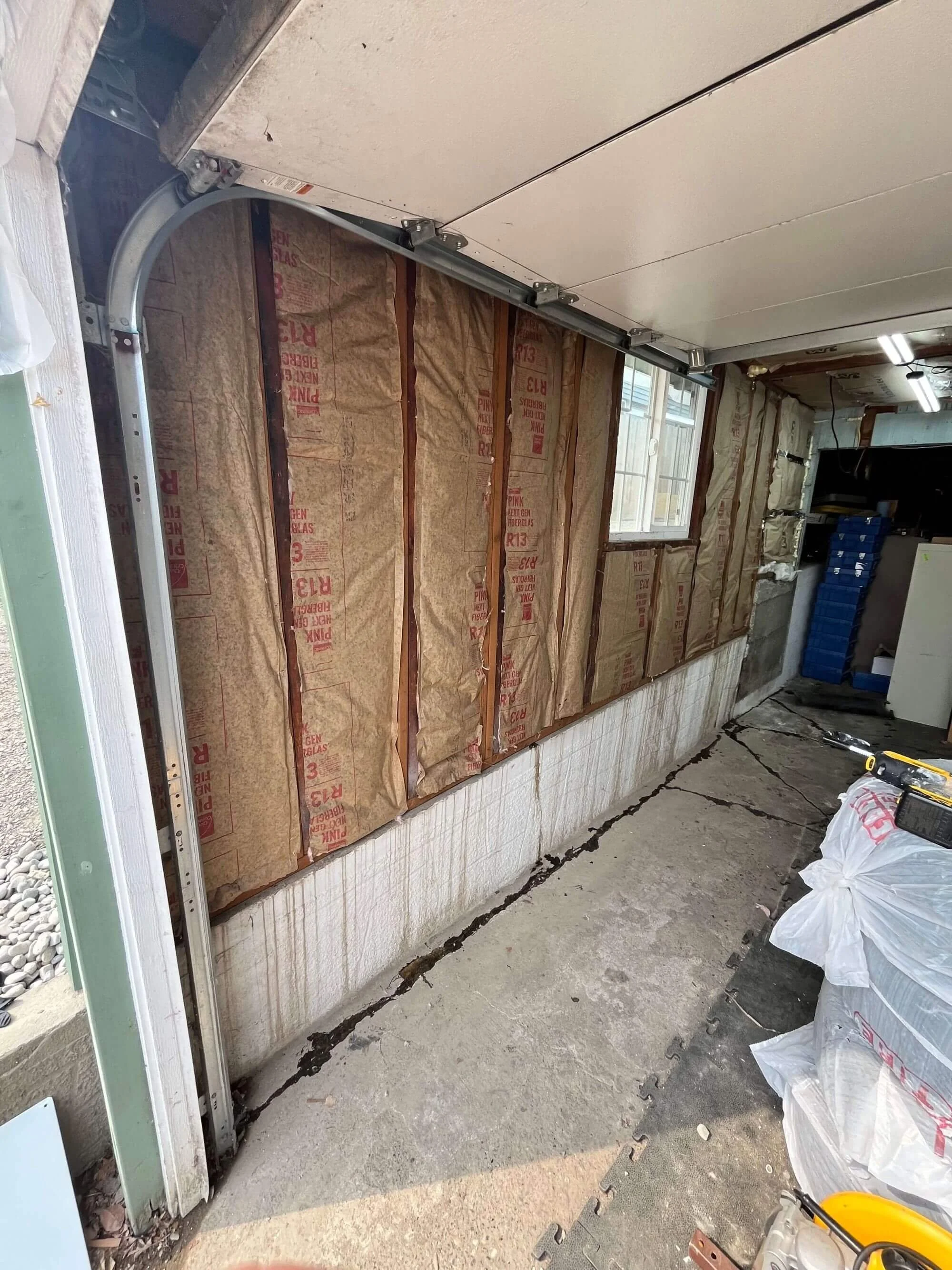 New siding and insulation installed in a West Seattle garage by Gold Mountain Contracting, a Seattle Siding Contractor.