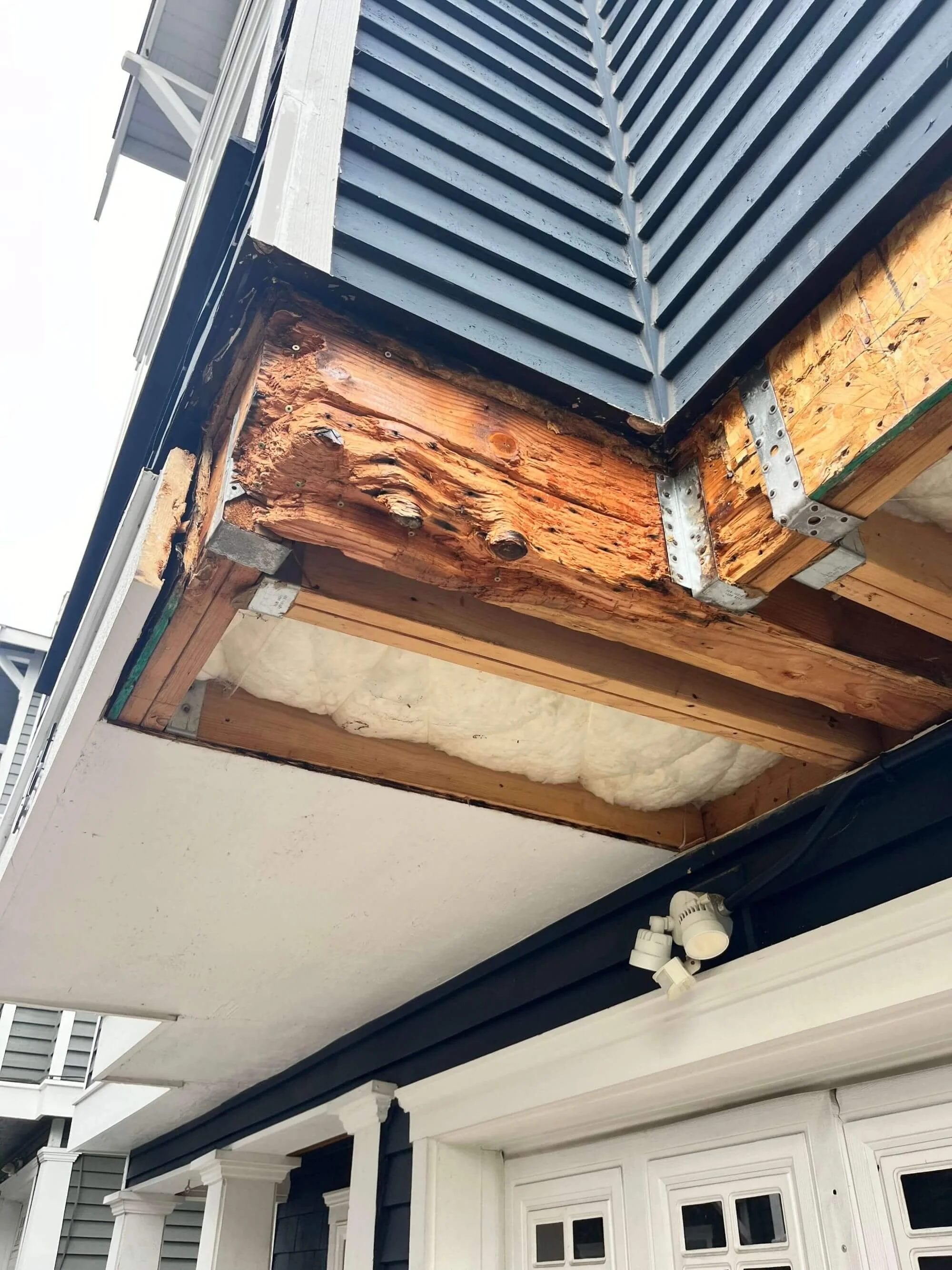 Framing and soffit repairs at a Seattle townhome, by Gold Mountain Contracting, a local Carpenter and Siding Contractor.