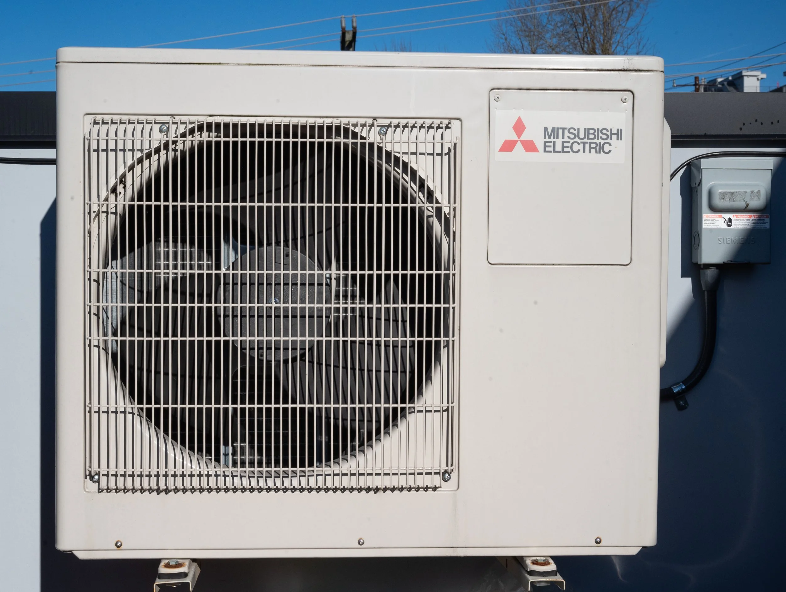 New rooftop HVAC unit with efficient mini split units for heating and air conditioning.