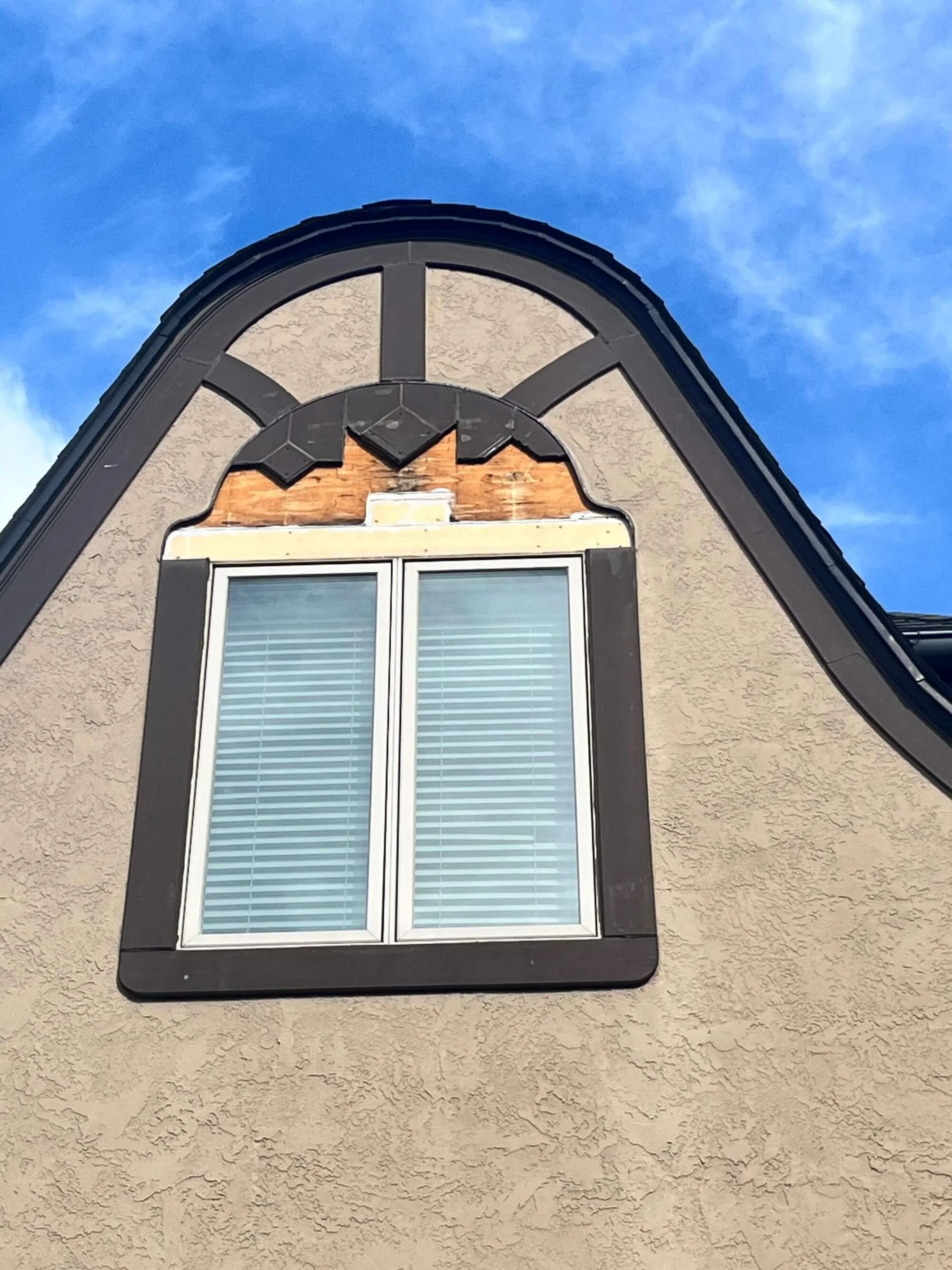 A water damaged window frame at an older home with a lot of character in Seattle.