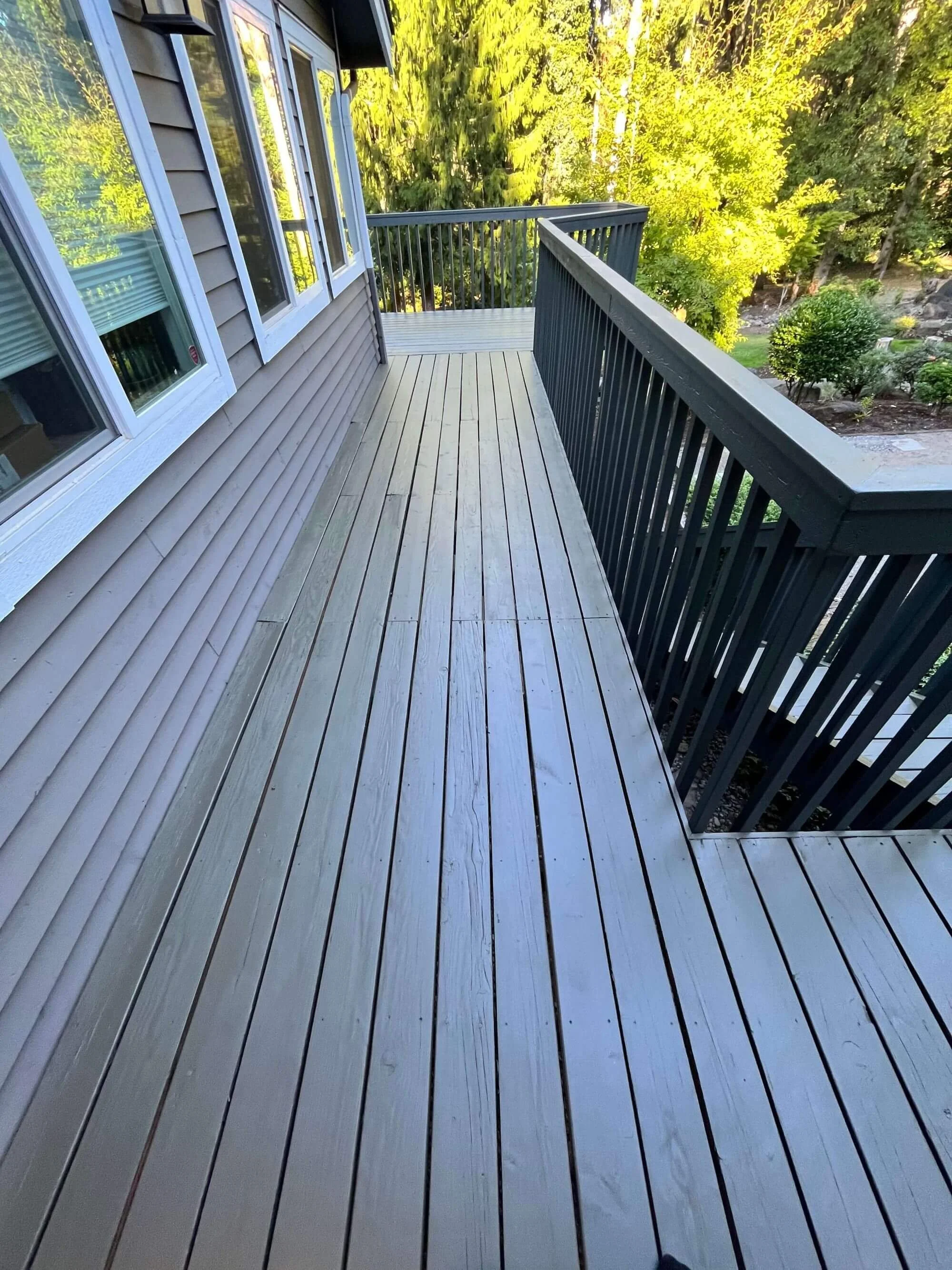 This wrap-around deck in Renton, WA just received a facelift from Gold Mountain Contracting, a local Deck Contractor.