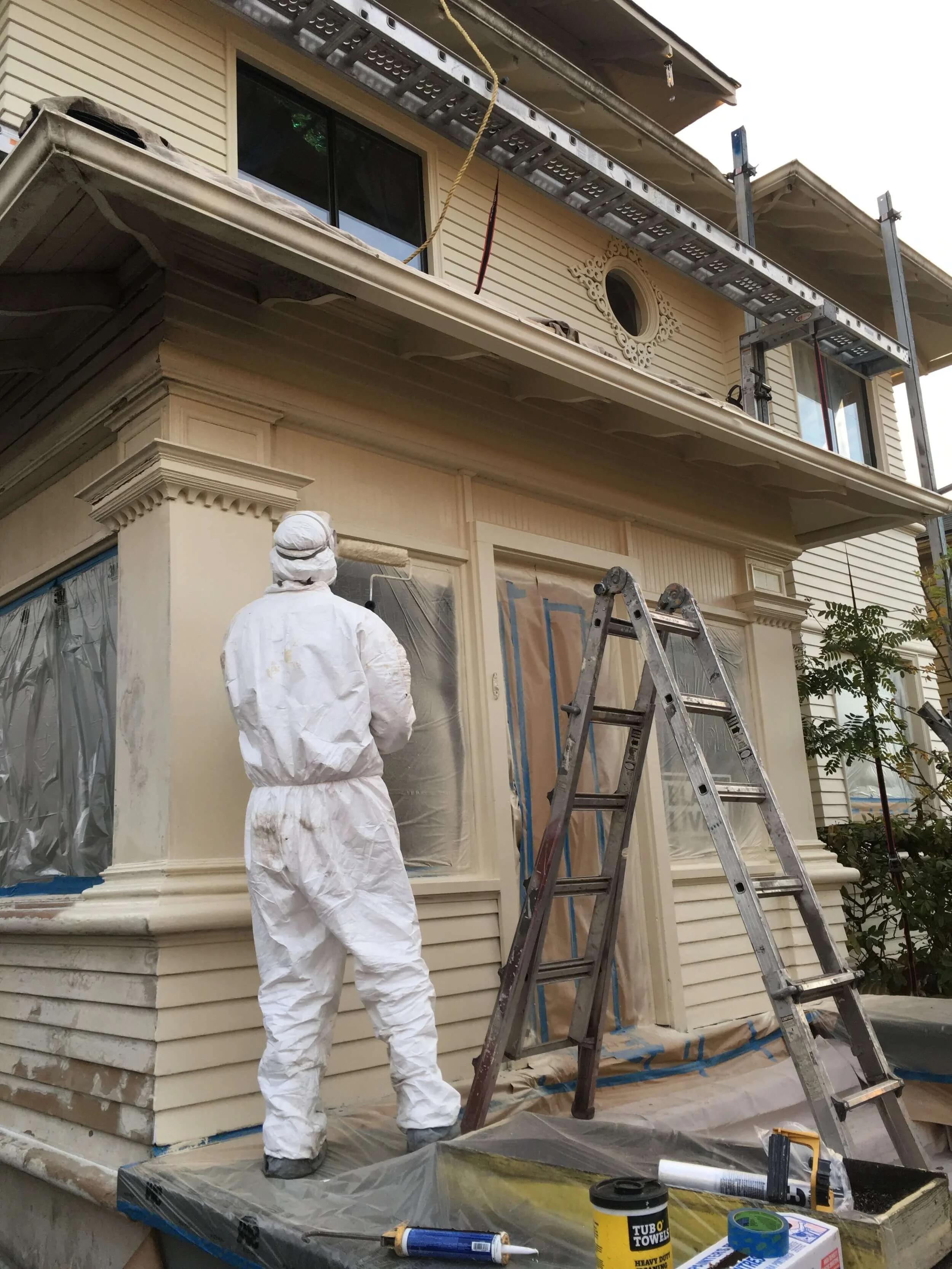 Residential exterior painter from Gold Mountain Contracting, doing work on a Seattle home.
