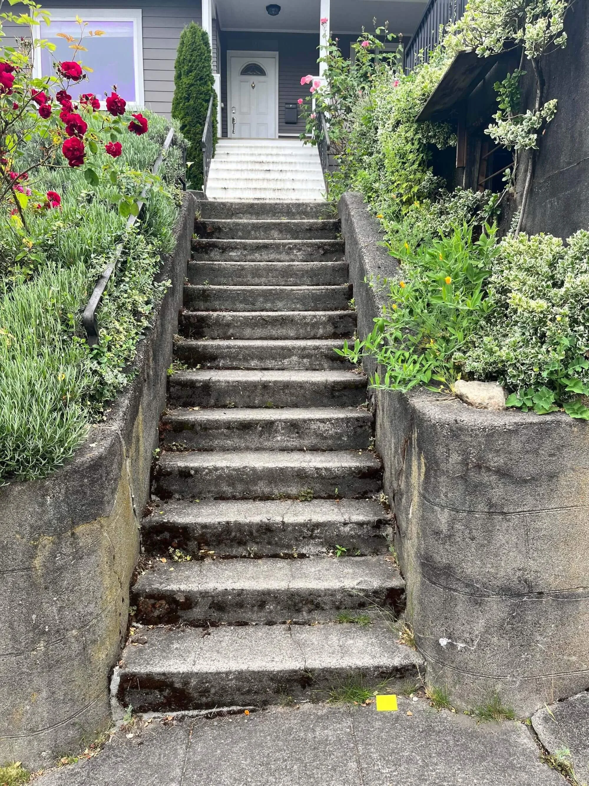 Before photo prior to a new metal handrail installation at a Seattle area home.