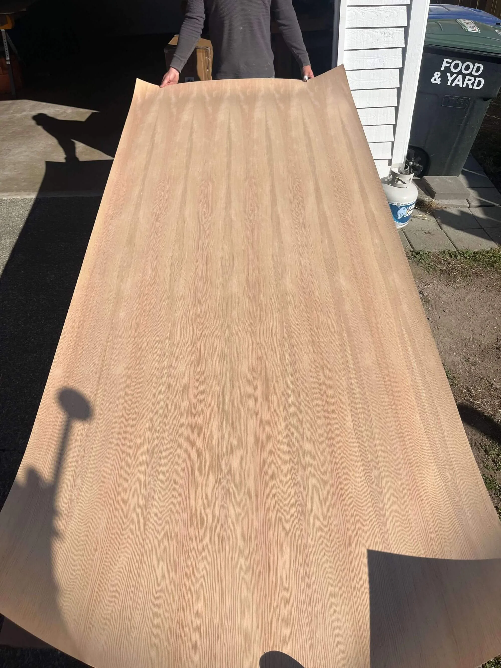 A beautiful new fir veneer to help refinish the front door of a home in Magnolia, Seattle.