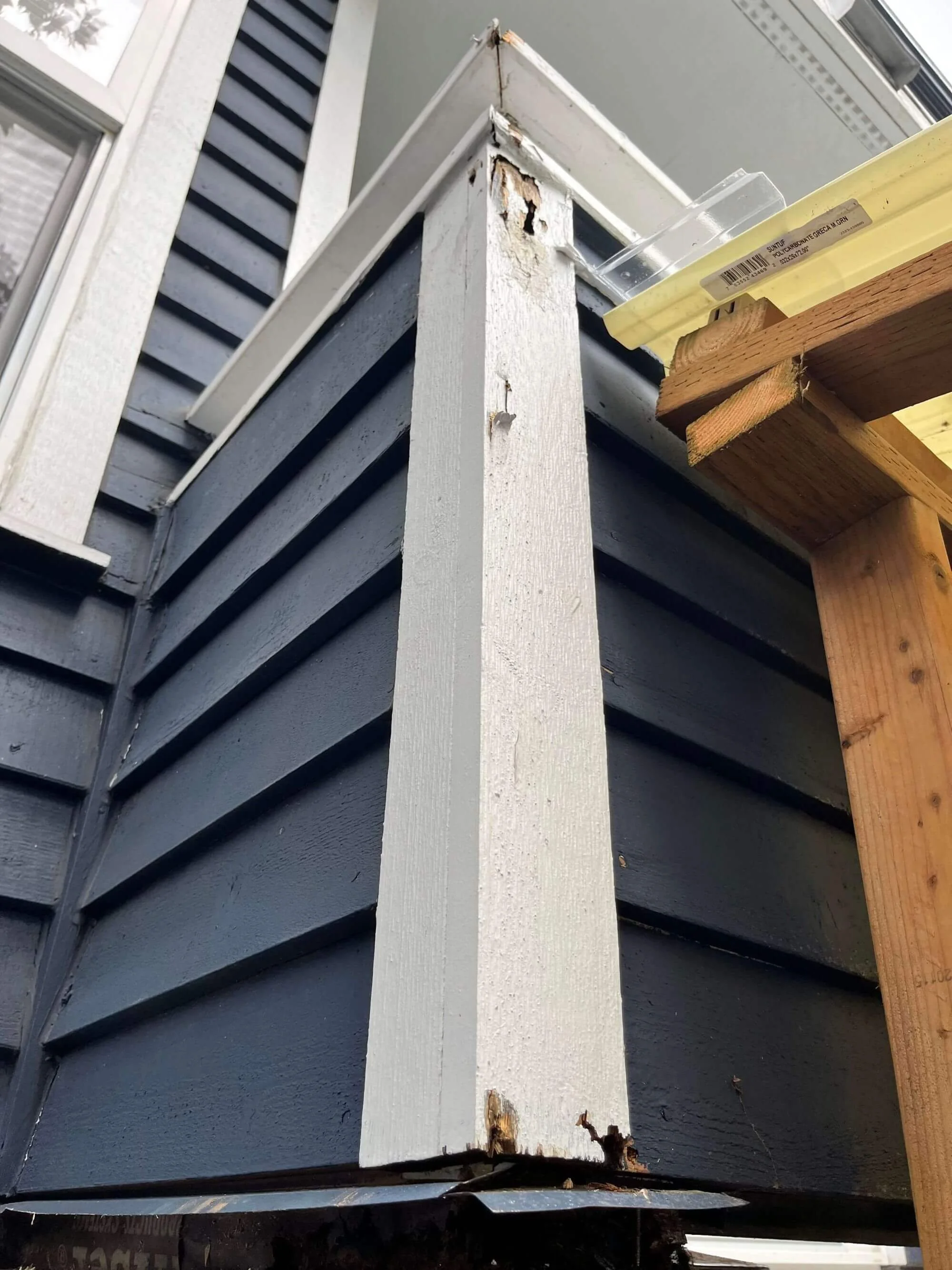 Many corners at this Seattle townhome needed wood frame repair and exterior painting to protect it from the rainy season.