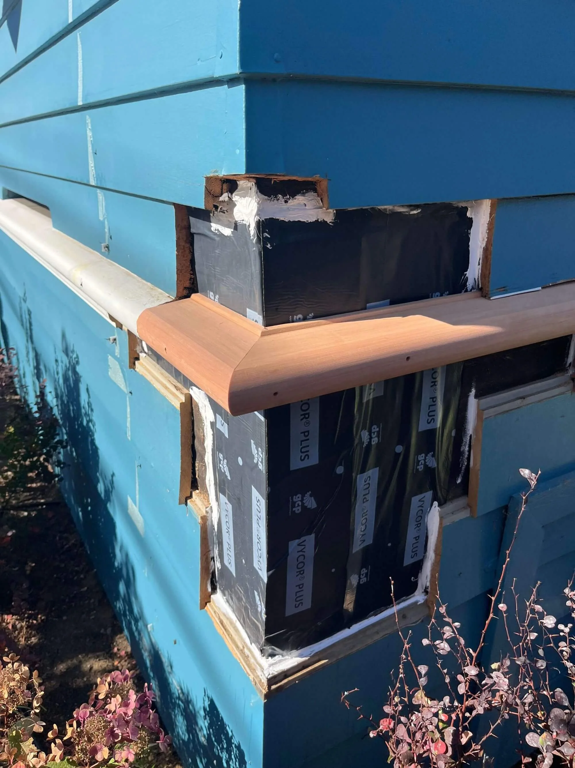 A corner siding repair project by Gold Mountain Contracting for a home in Queen Anne, Seattle, dealing with water intrusion.