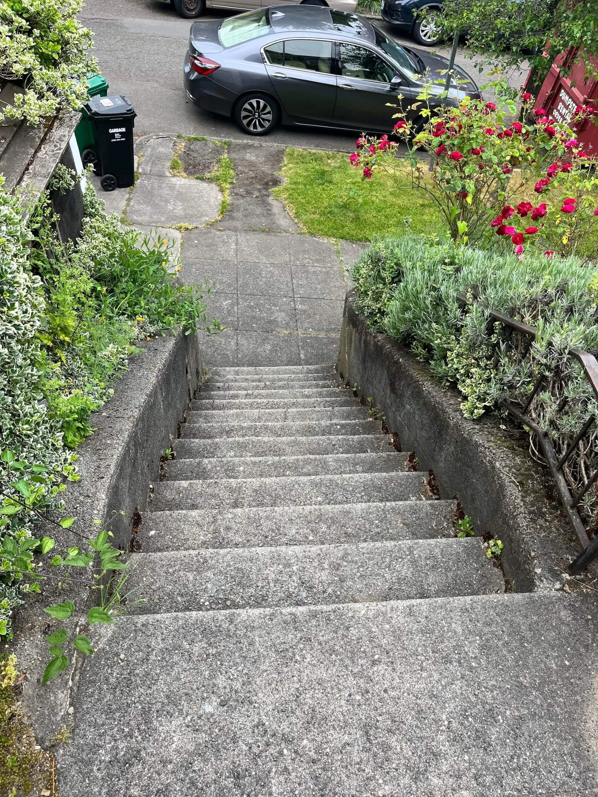 New exterior handrail project before photo to meet Seattle rental home regulations. Gold Mountain Contracting is on it!