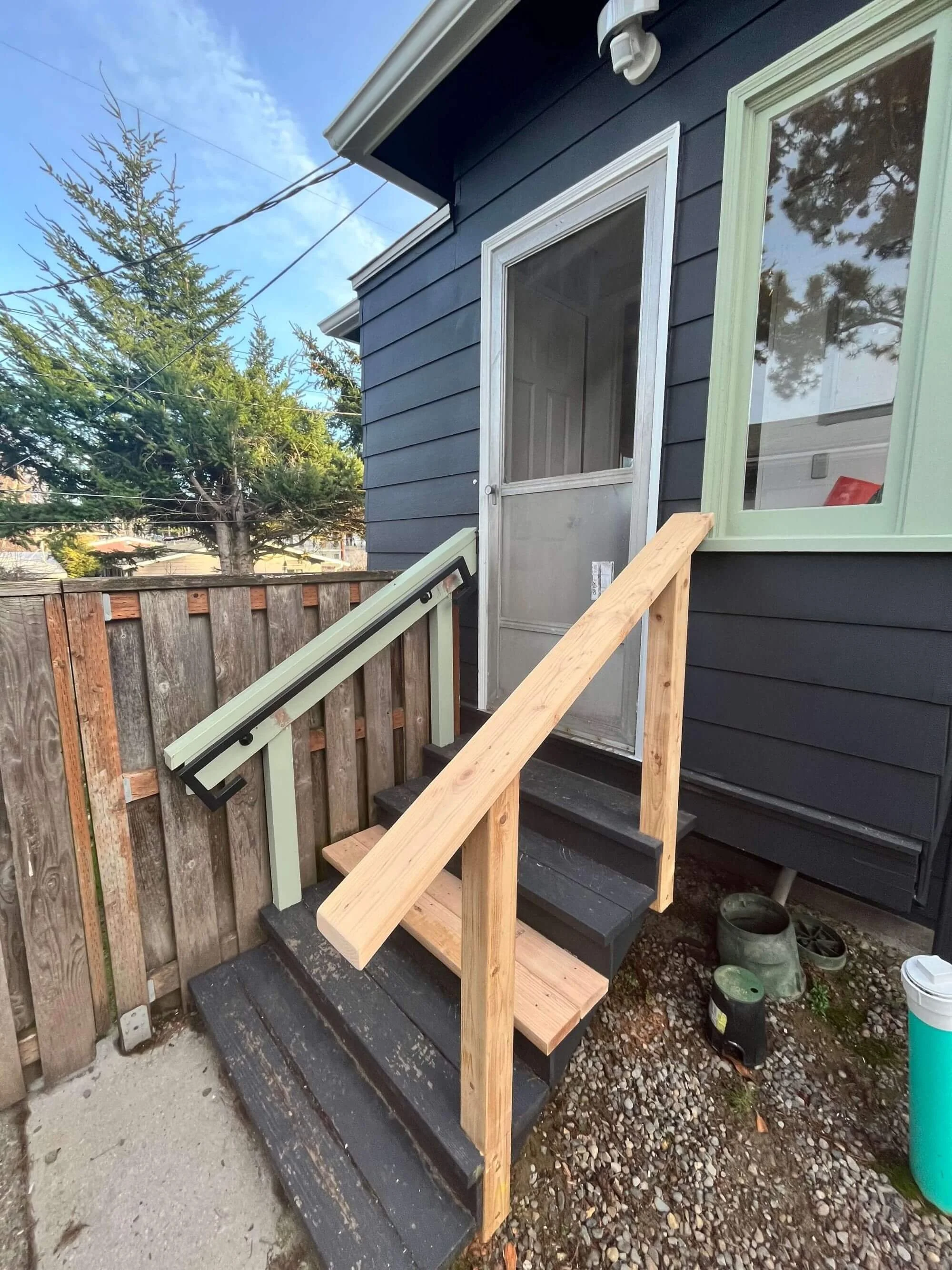 A handrail repair project for a home in West Seattle, designed and built by Gold Mountain Contracting.