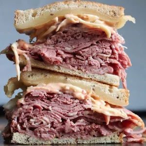 RALPH AND RICHIES Mini corned beef sandwiches | Reuben sandwich- fresh, cured corned beef with sauerkraut or cole slaw and mustard or thousand