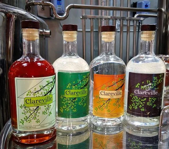   CITRUS GROVE DISTILLERS     @citrusgrovedistillers   The American Treasure (GF) Craft Distilled Clareville Bourbon with a slow stirred syrup composed of a mixed berry medley elevated by hand harvested herbs and citrus, topped with sparkling water a