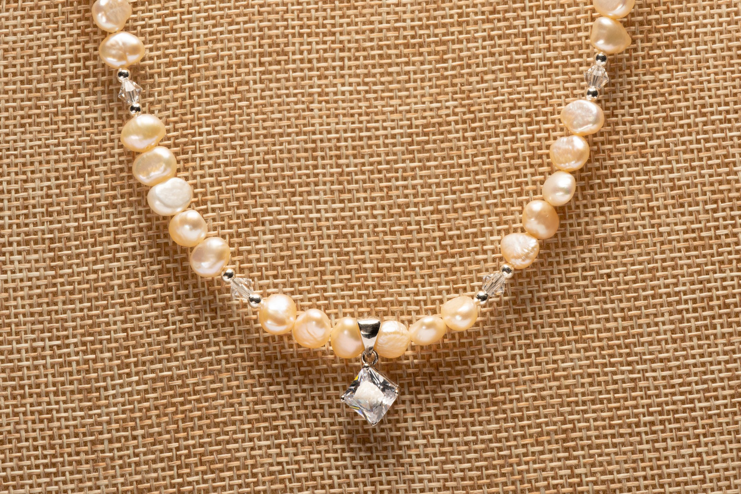 Peach Pearls with Cubic Pendant