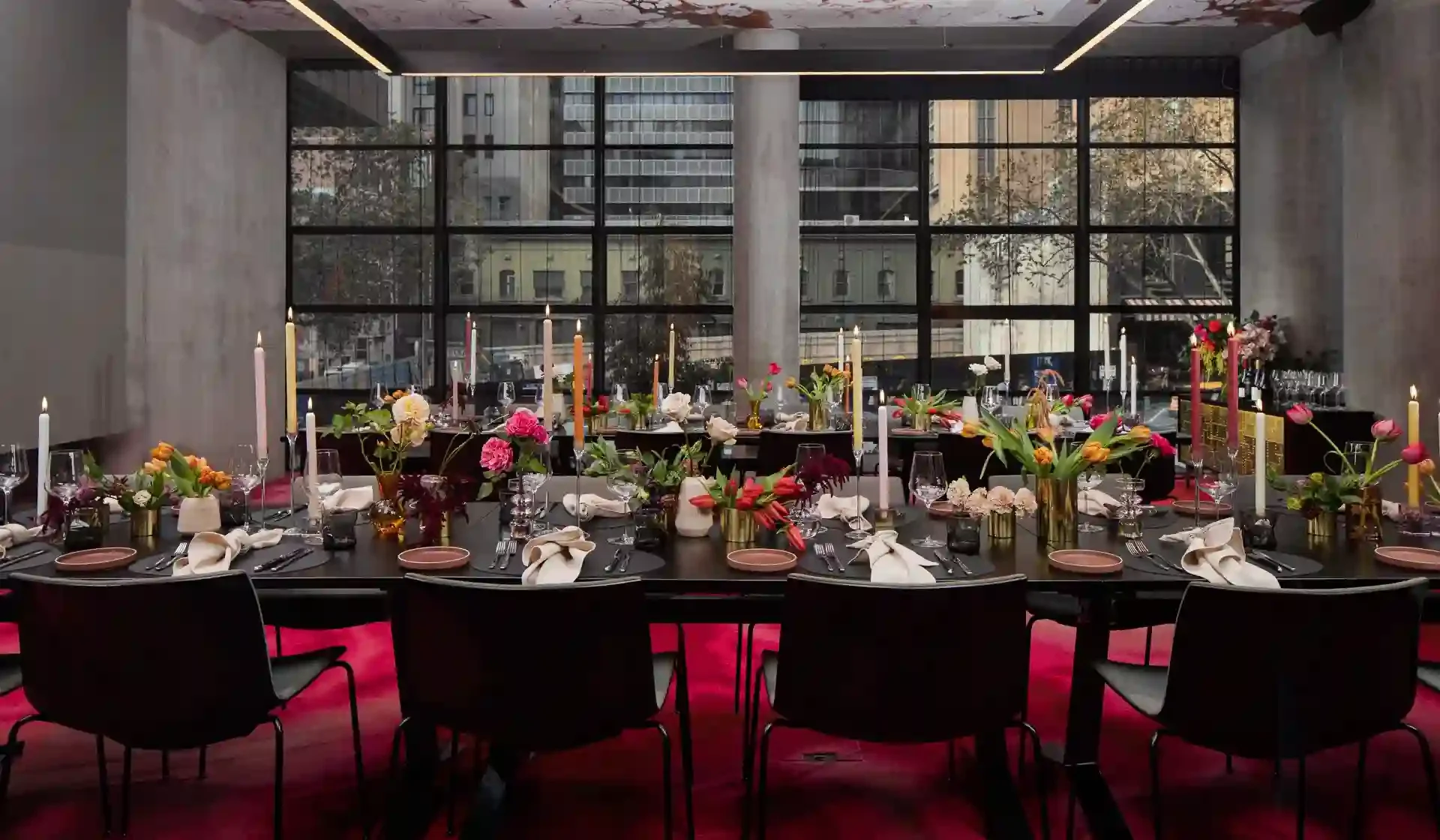 Modern dining and event setup at QT Melbourne captured by Pixel Booth – stylish venue for corporate functions and private events in Melbourne CBD.