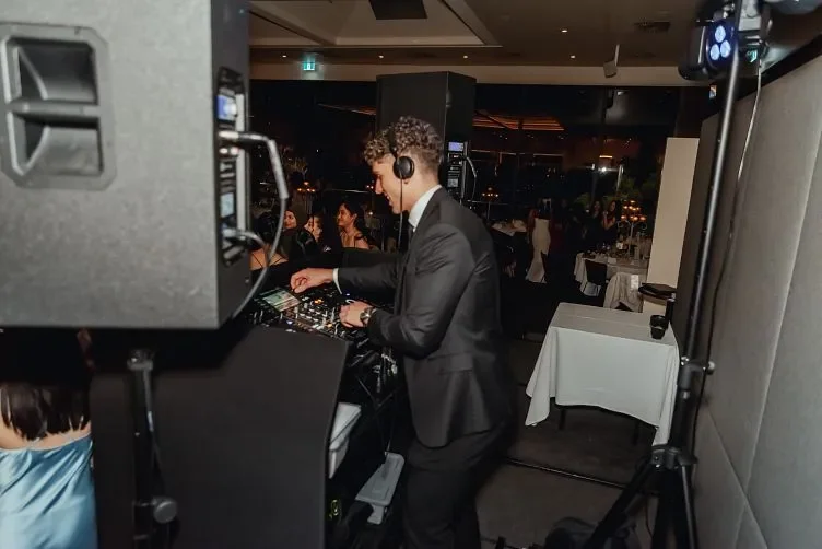 DJ mixing tracks at a stylish Springvale event — Pixel Booth DJ hire Melbourne for weddings, engagements, and parties.