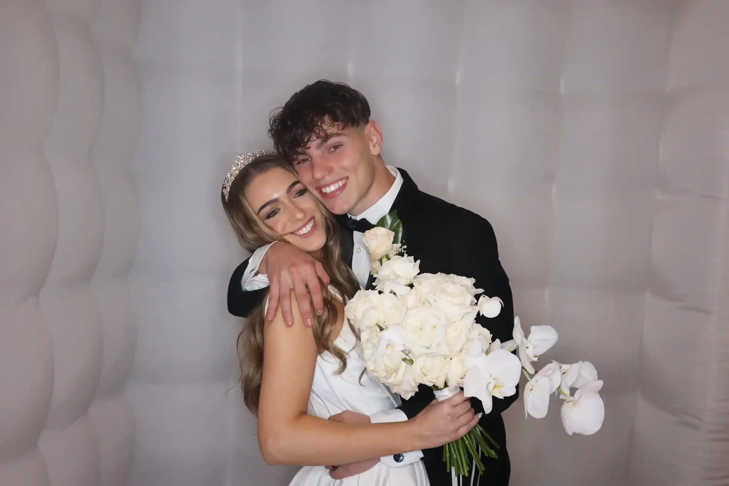Wedding photo booth St Kilda— bride and groom inside inflatable bubble booth