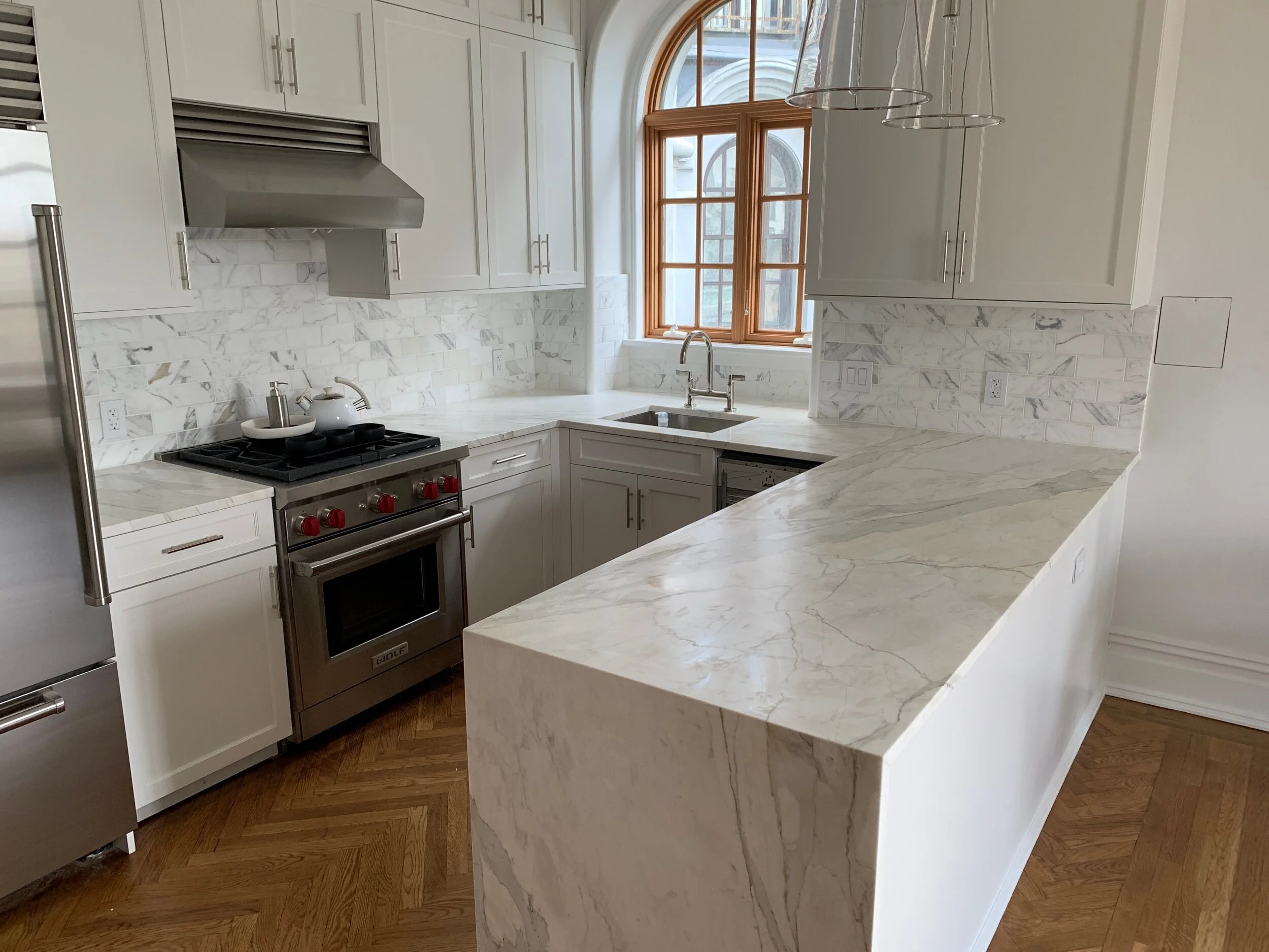 Calacatta Marble Kitchen waterfall.jpeg