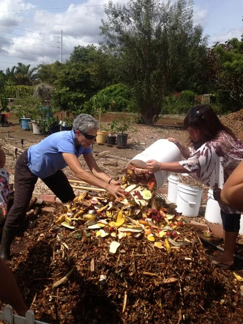 Mindy and participants start emptying out the buckets of food waste