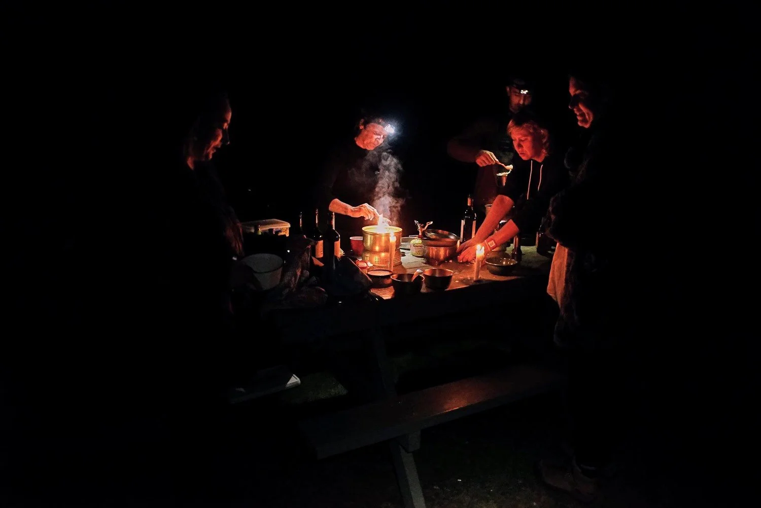 Showing cuttlefish like adaptability, the joyously adventurous 2018 crew are seen here cooking a camp dinner for a large group in the dark, deep in The Coorong on night one.