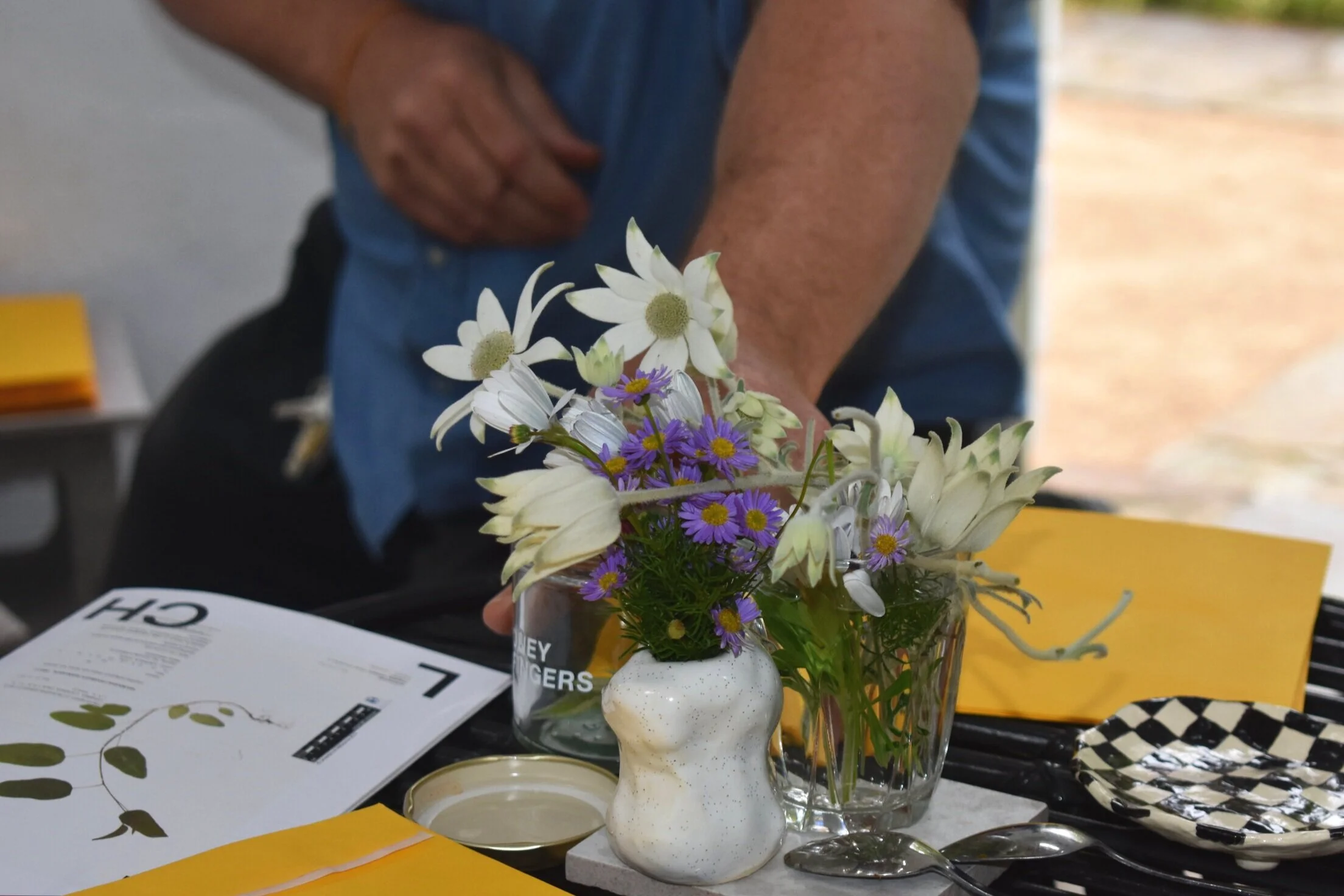  Honeyfingers; poetry reading and lemon myrtle tea ceremony. Nic Dowse - founder of community based urban beekeeping collective Honeyfingers published a small run of his poems based on flowers that are found local to the System Garden and included hi