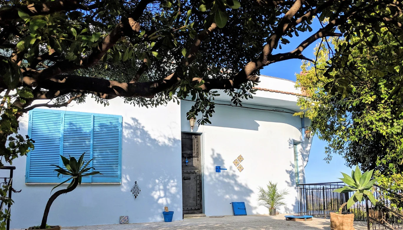 9 house front villa ama sicily.jpg