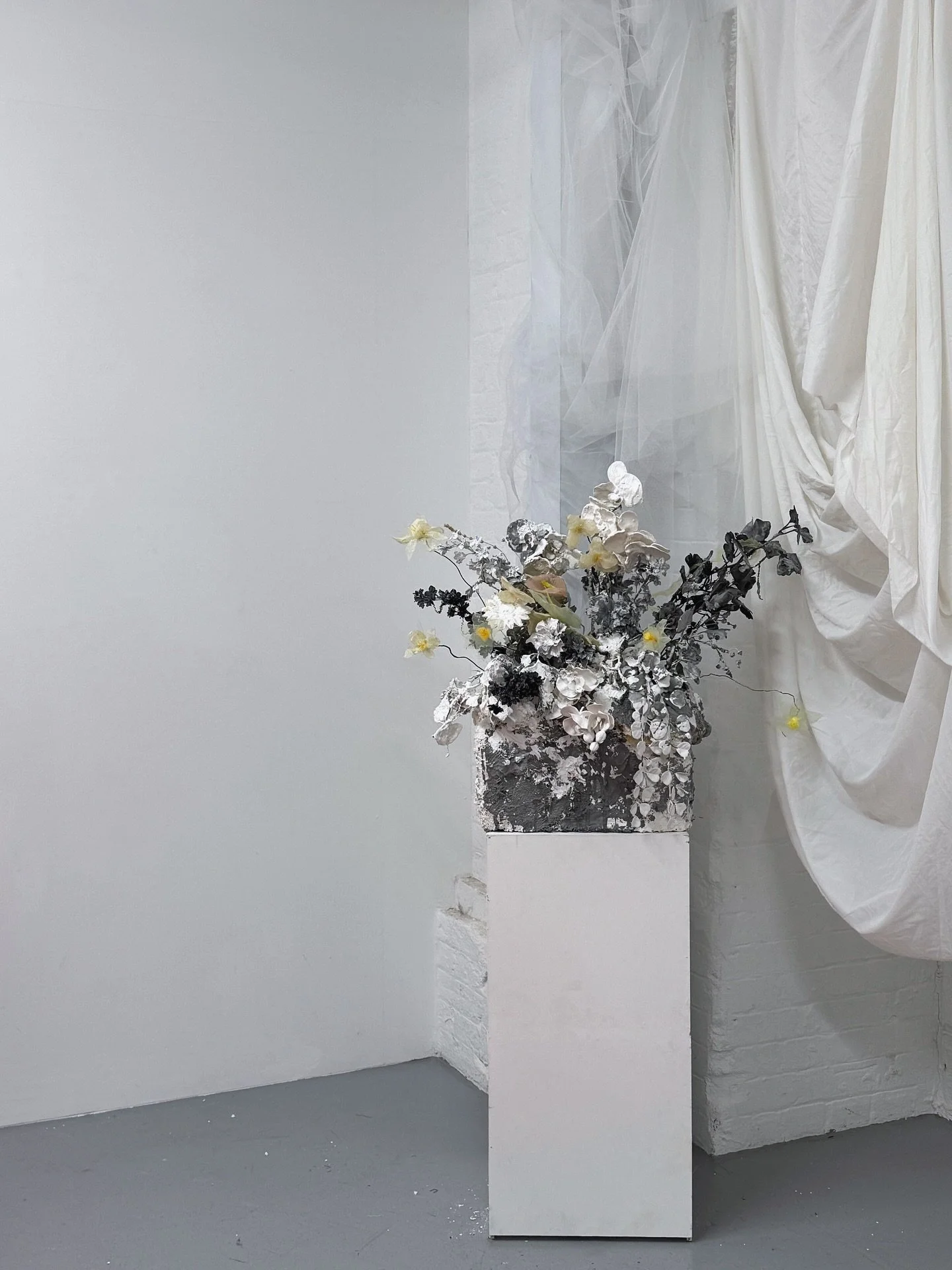 One of the pieces created for Yarli Allison&rsquo;s art film In Petri Dishes We Sing 
A flower arrangement made from fabric, coated with concrete and plaster &mdash; where fragility meets solidity.

Part of her moving-image installation at Brent Bien