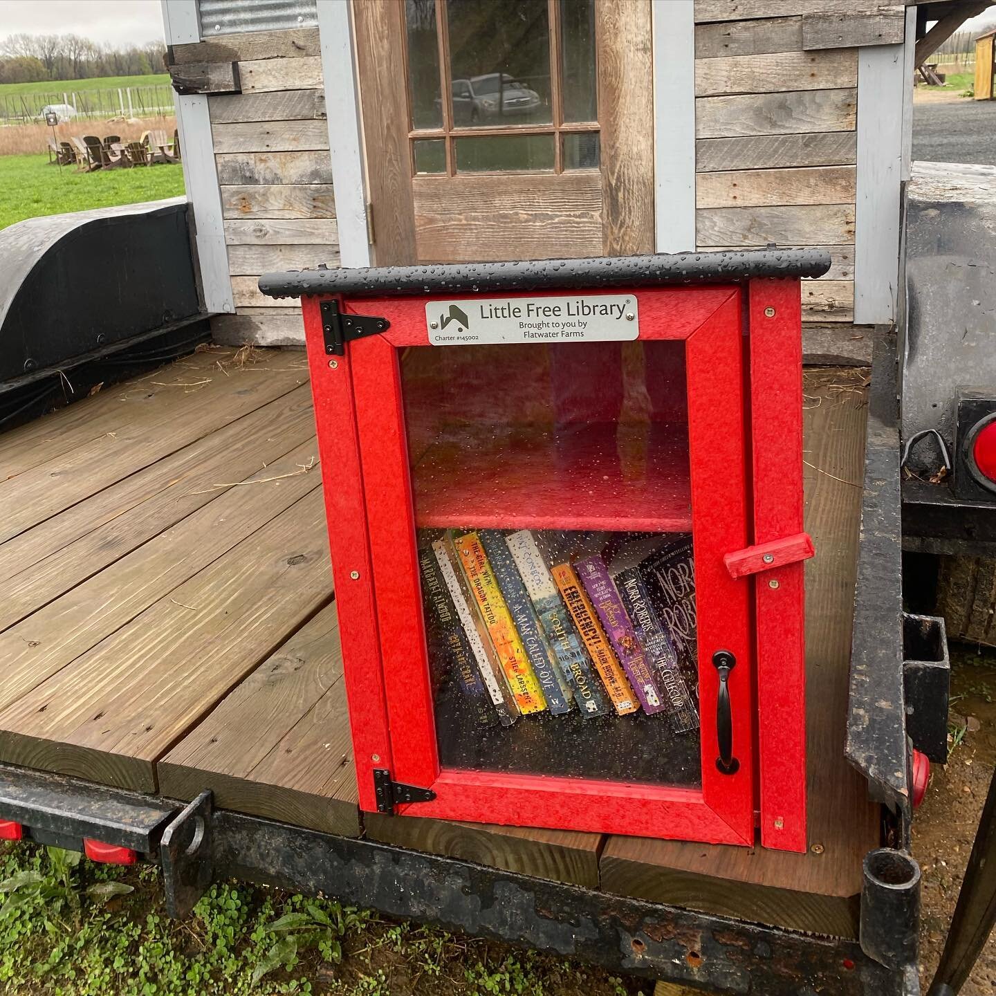 Book for a rainy day? Thank you @flatwaterfarms for our #littlefreelibrary #freepressday #readabooktoday