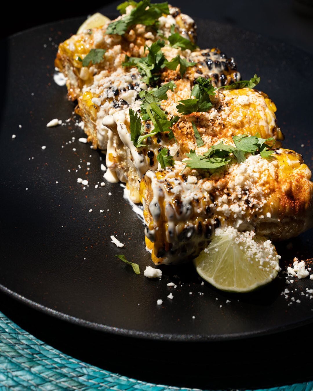 Messy to eat, but worth every bite 👌⁣
⁣
Our elotes are here for the summer! ⁣
⁣
Mexican style street corn, charred and topped with aioli, chilli powder, Cotija cheese and cilantro.