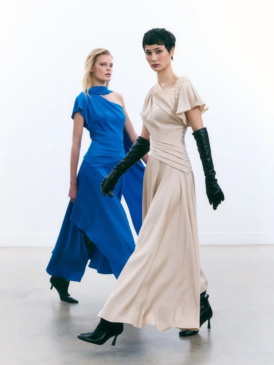 Movement defines the silhouette.Fabric wraps, falls, and releases, creating form through motion .jpg
