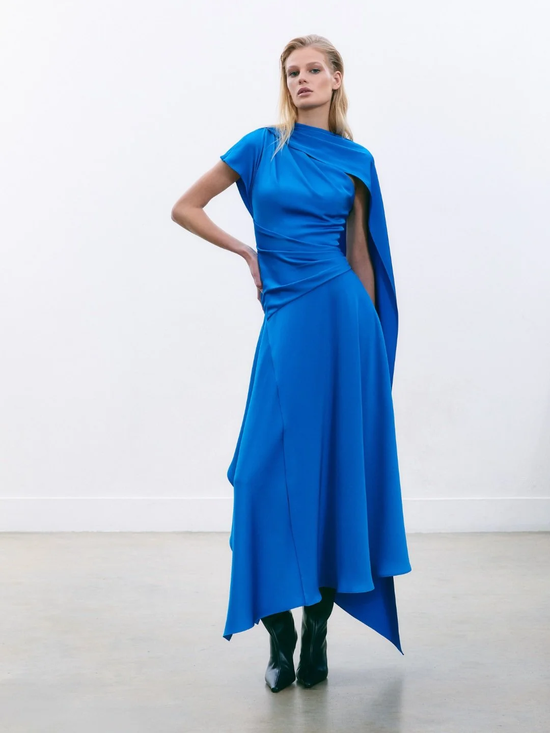 AW26Brit for Maisonel, in blue.A one-shoulder silhouette shaped through soft drape and an integr (2).jpg