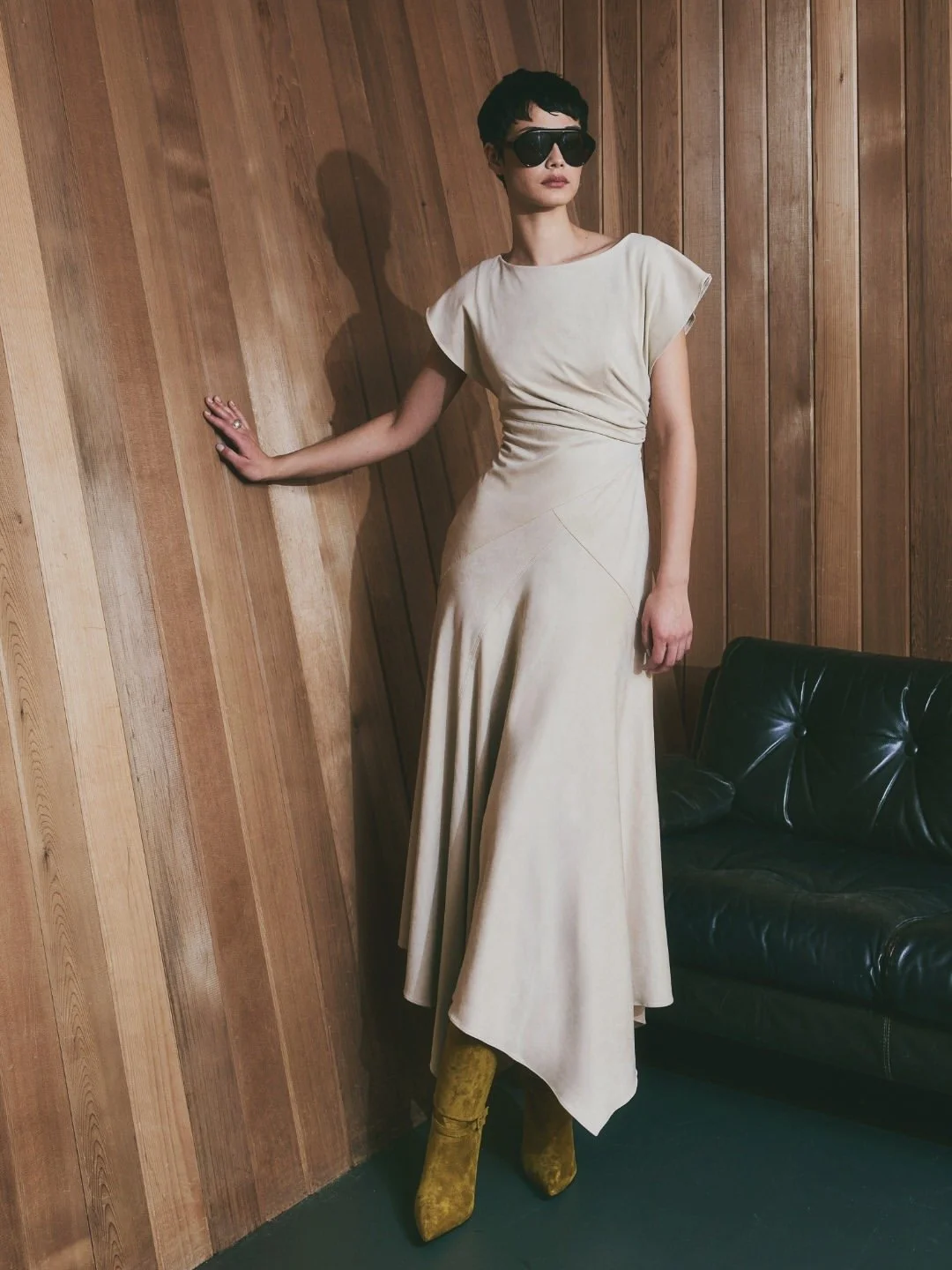 Becca for Maisonel.A suede midi defined by panelled construction and precise topstitching.One-si.jpg
