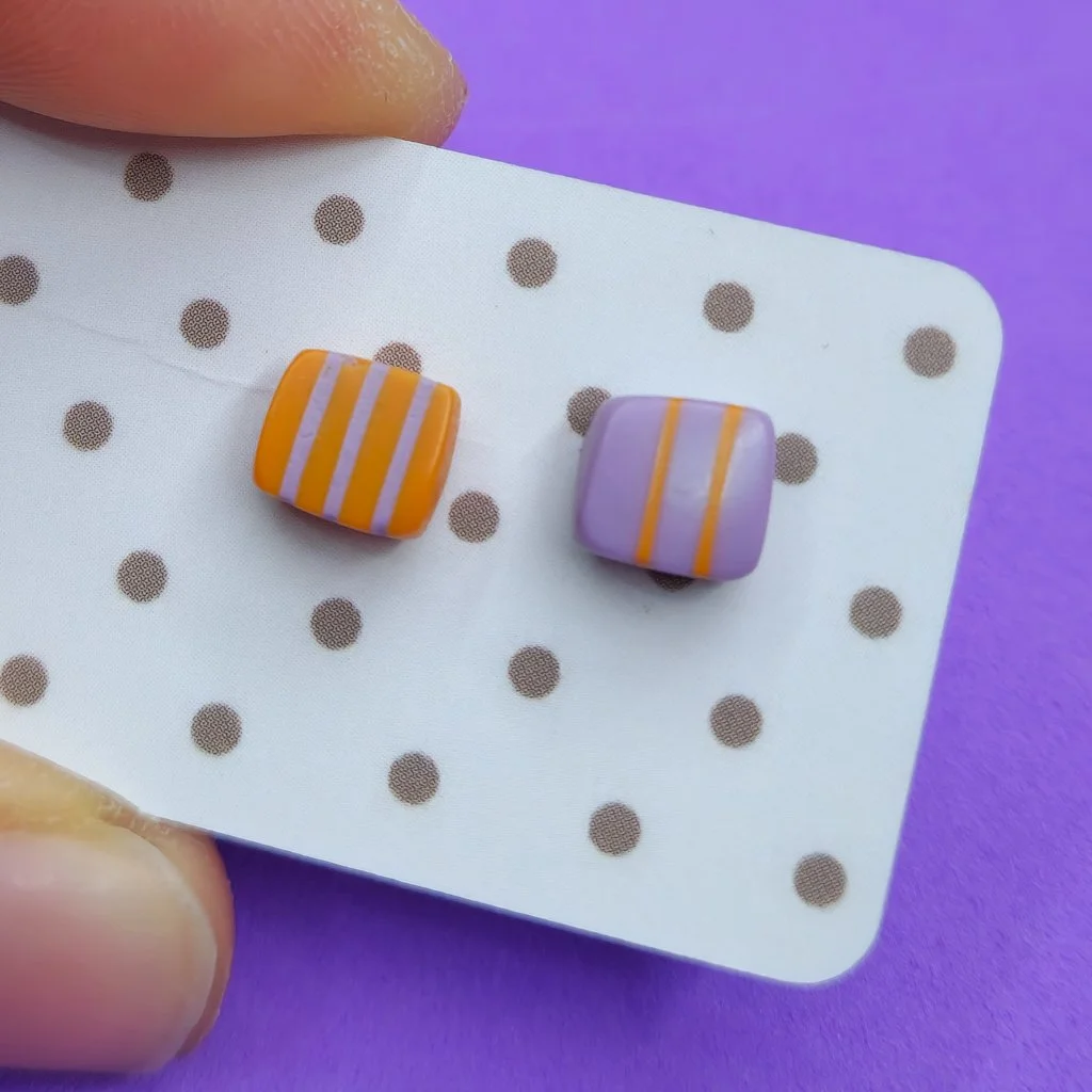 Mini resin stud earrings - orange with lilac stripes and lilac with orange stripes