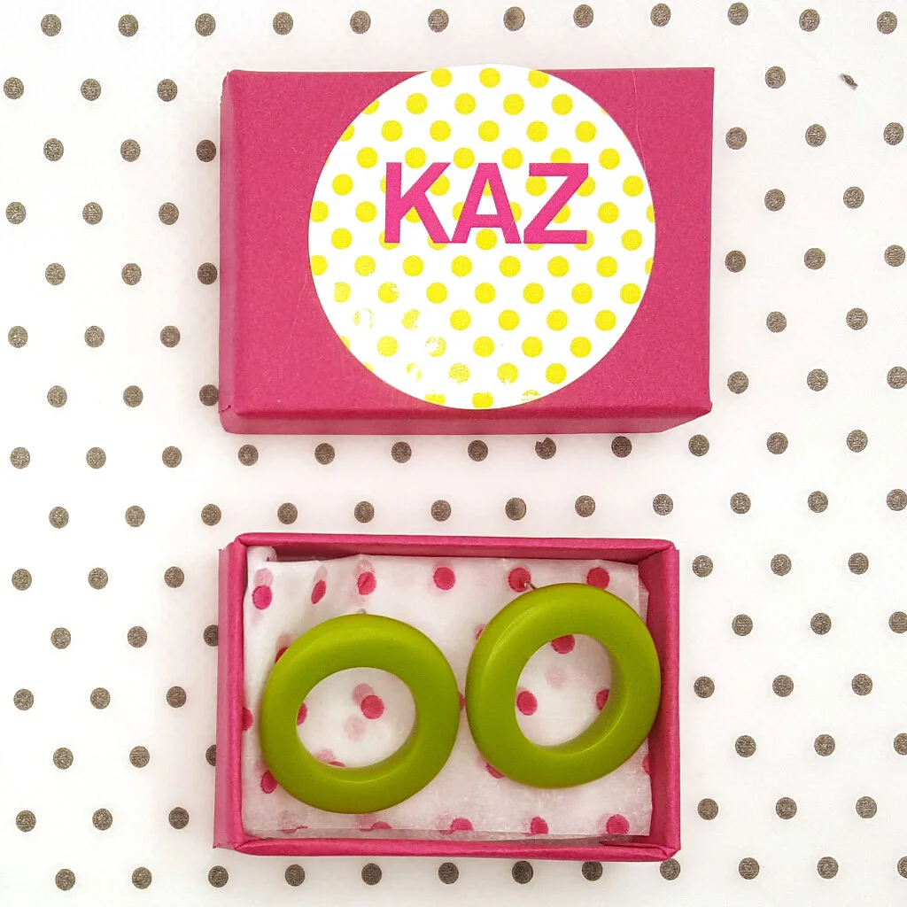 gorgeous green resin hoop studs gift wrapped in KAZ jewellery box.
