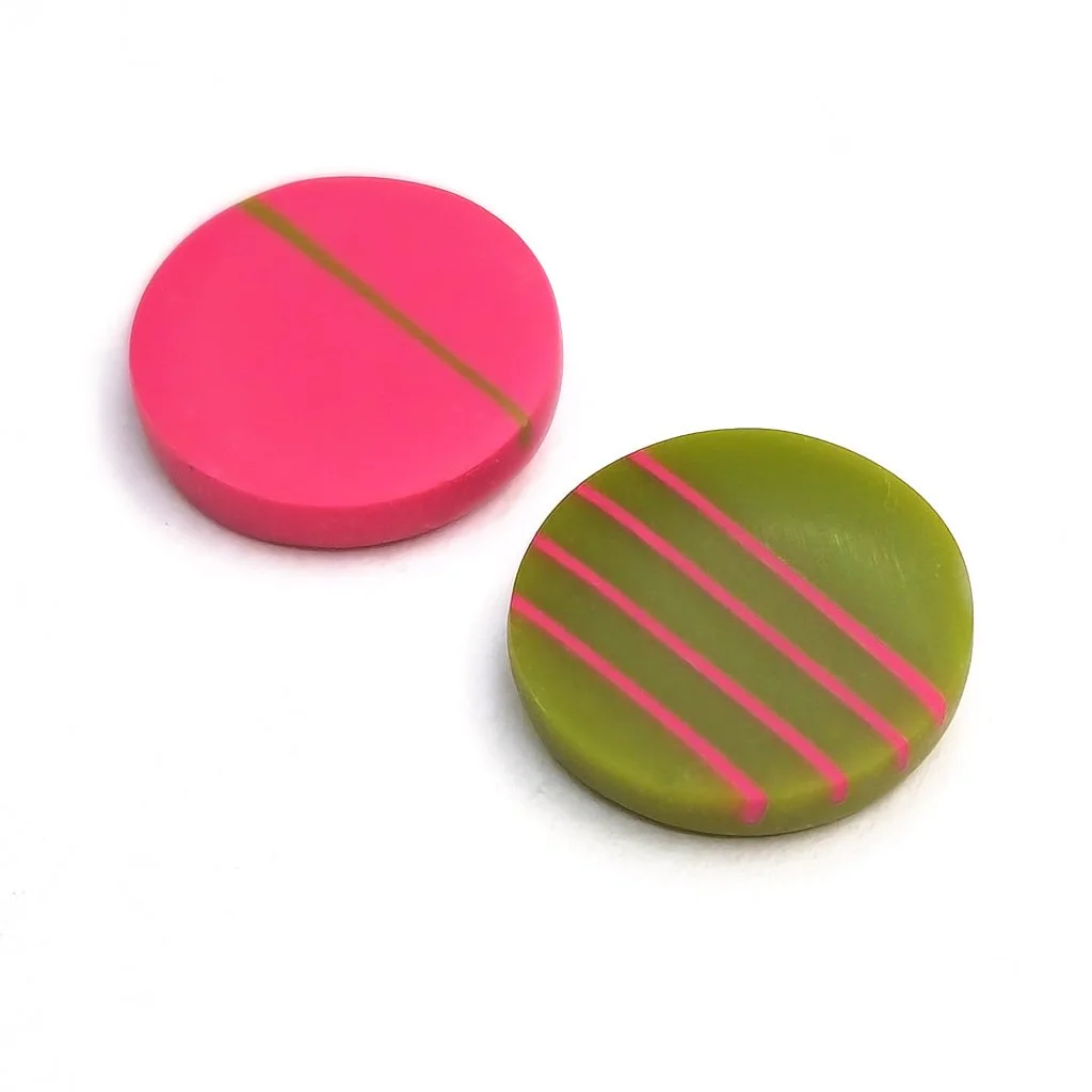 green-pink-stripes-round-studs.jpg