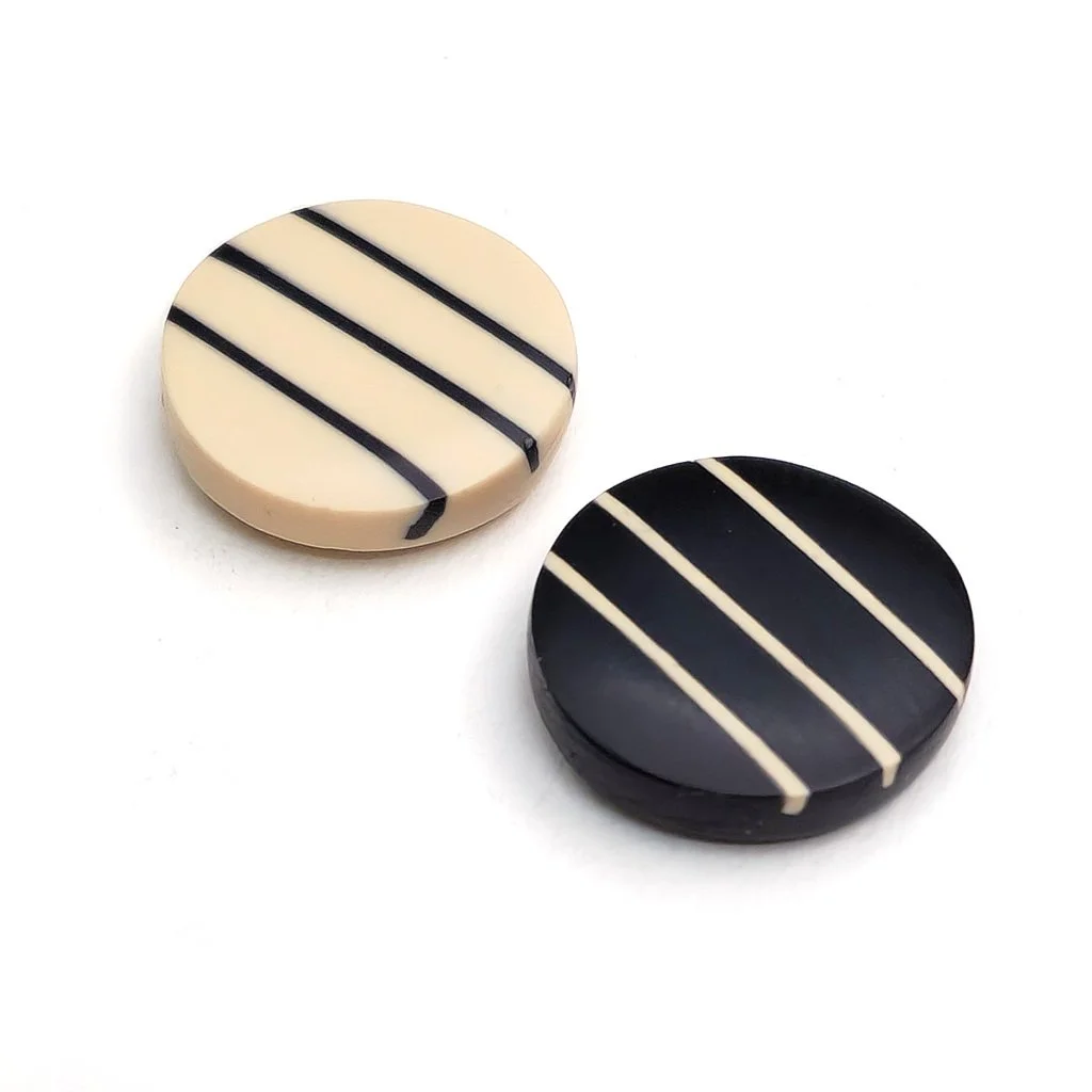 black-nude-mismatch-stripe-resin-studs.jpg