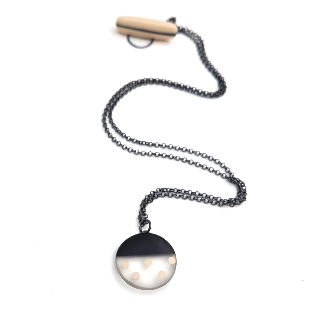 Mini round resin pendant - black with nude spots
