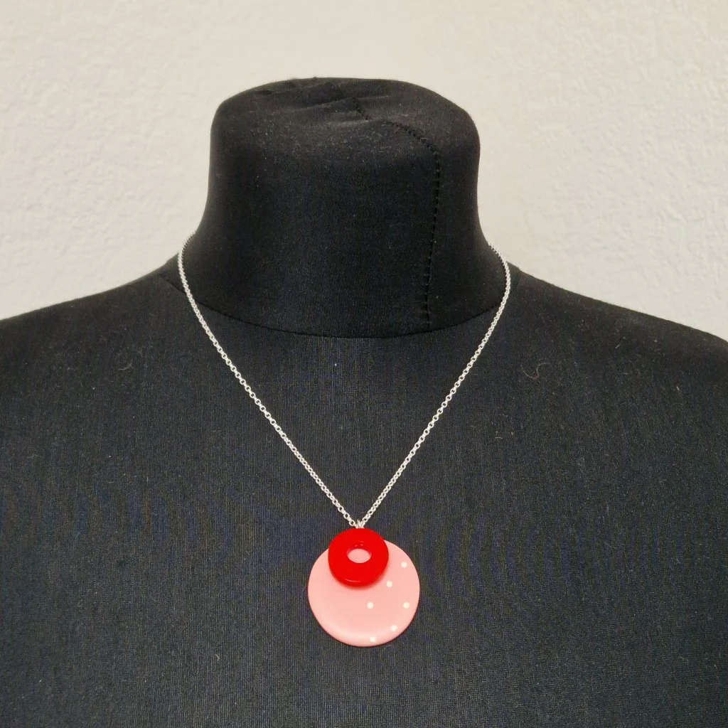 pink-reversible-ss-pendant-modelled.jpg