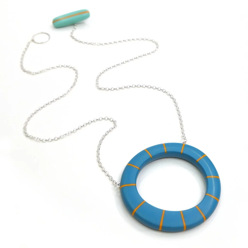 blue-hoop-pendant-orange-stripes-kaz.jpg
