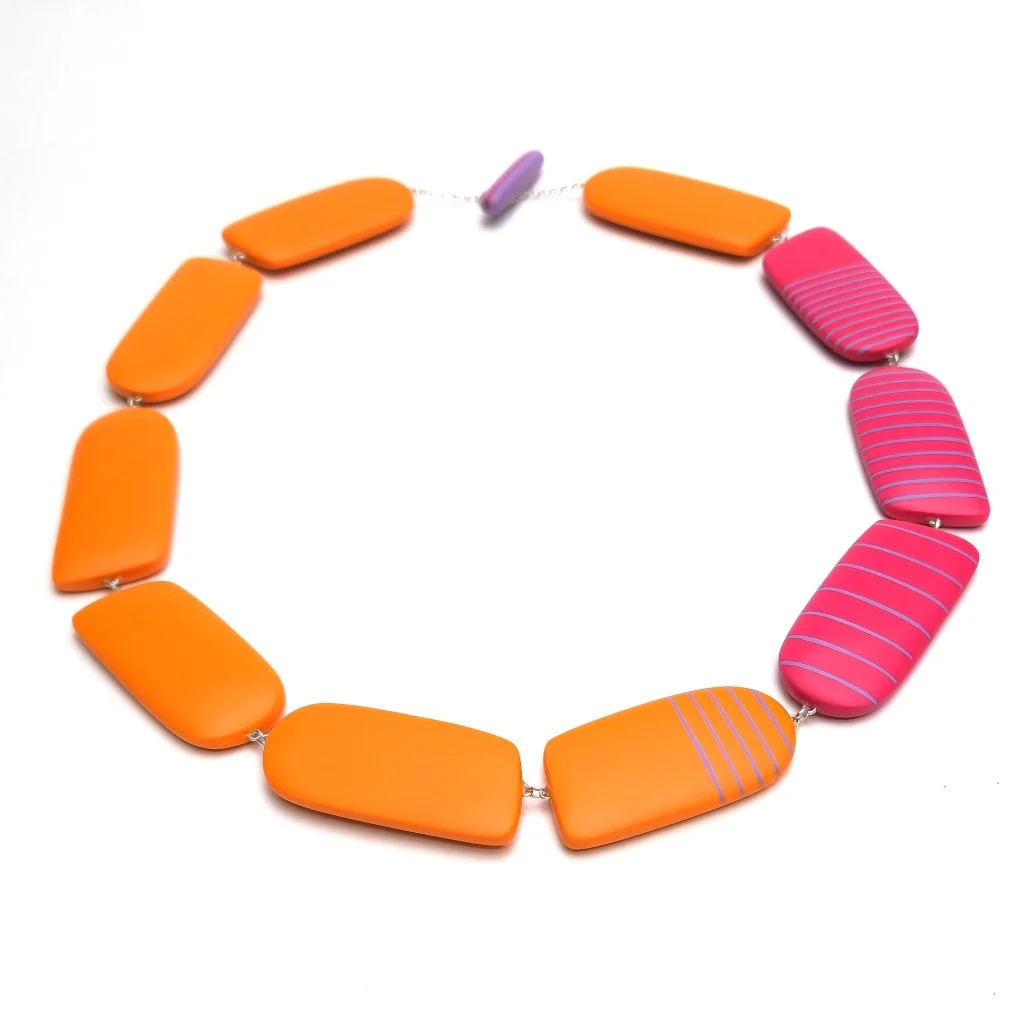 Reversible arch resin necklace - orange, cerise and lilac