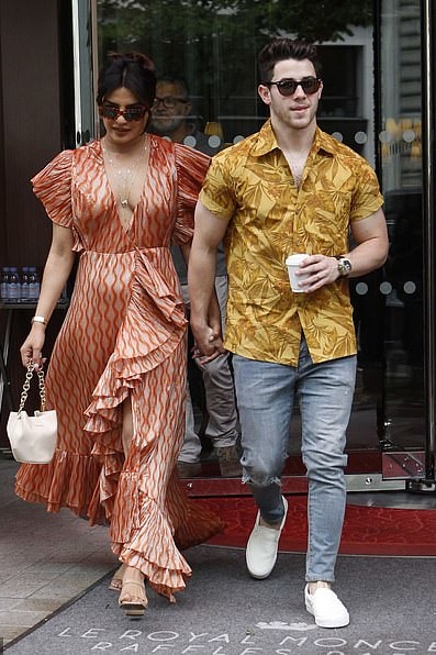 priyanka-chopra-makarian-orange-printed-dress-paris.jpg