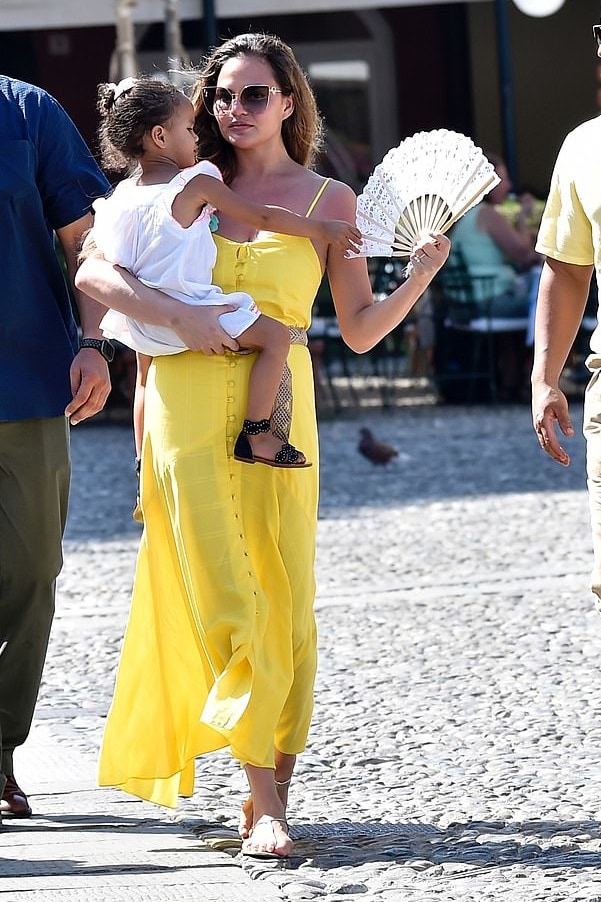 chrissy-teigen-mara-hoffman-yellow-maxi-dress-in-italy.jpg