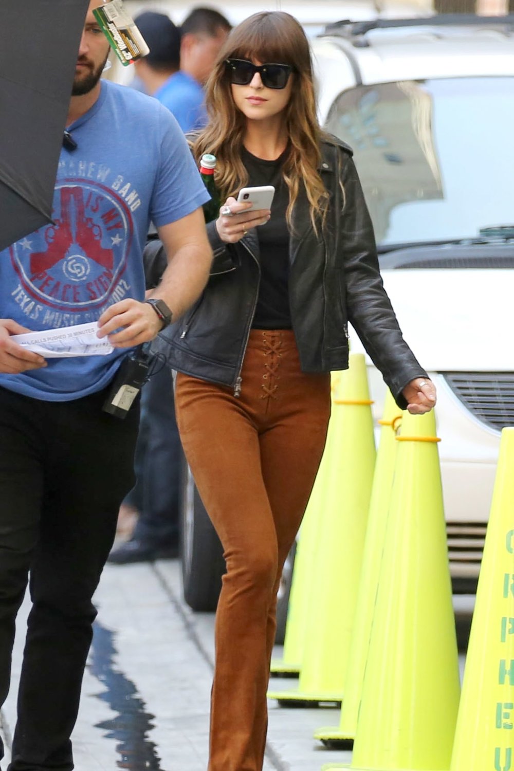 dakota-johnson-brown-pants.jpg
