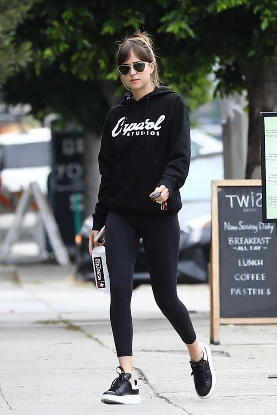dakota-johnson-capital-records-black-hoodie-leaving-yoga.jpg
